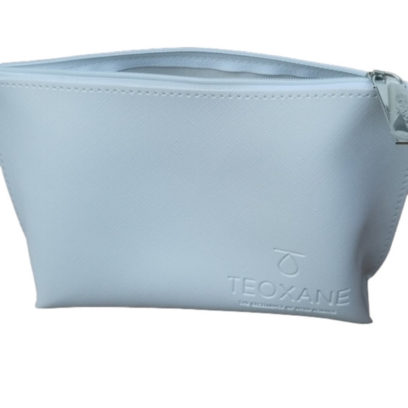 Handbags - 3/$25 WHITE Teoxane Makeup Pouch